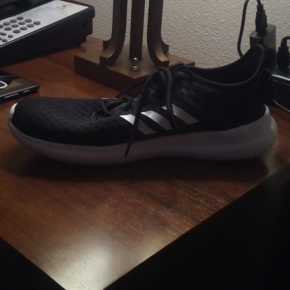 A pair of Adidas shoes. - Picture 2 of 2